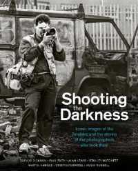 Shooting the Darkness : Iconic images of the Troubles and the stories of the photographers who took them