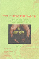 Touching the Earth: a Buddhist Guide to Saving the Planet