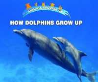 How Dolphins Grow Up (Animals Growing Up) （Library Binding）