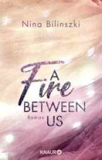 A Fire Between Us : Roman (Between Us-Reihe) （3. Aufl.）